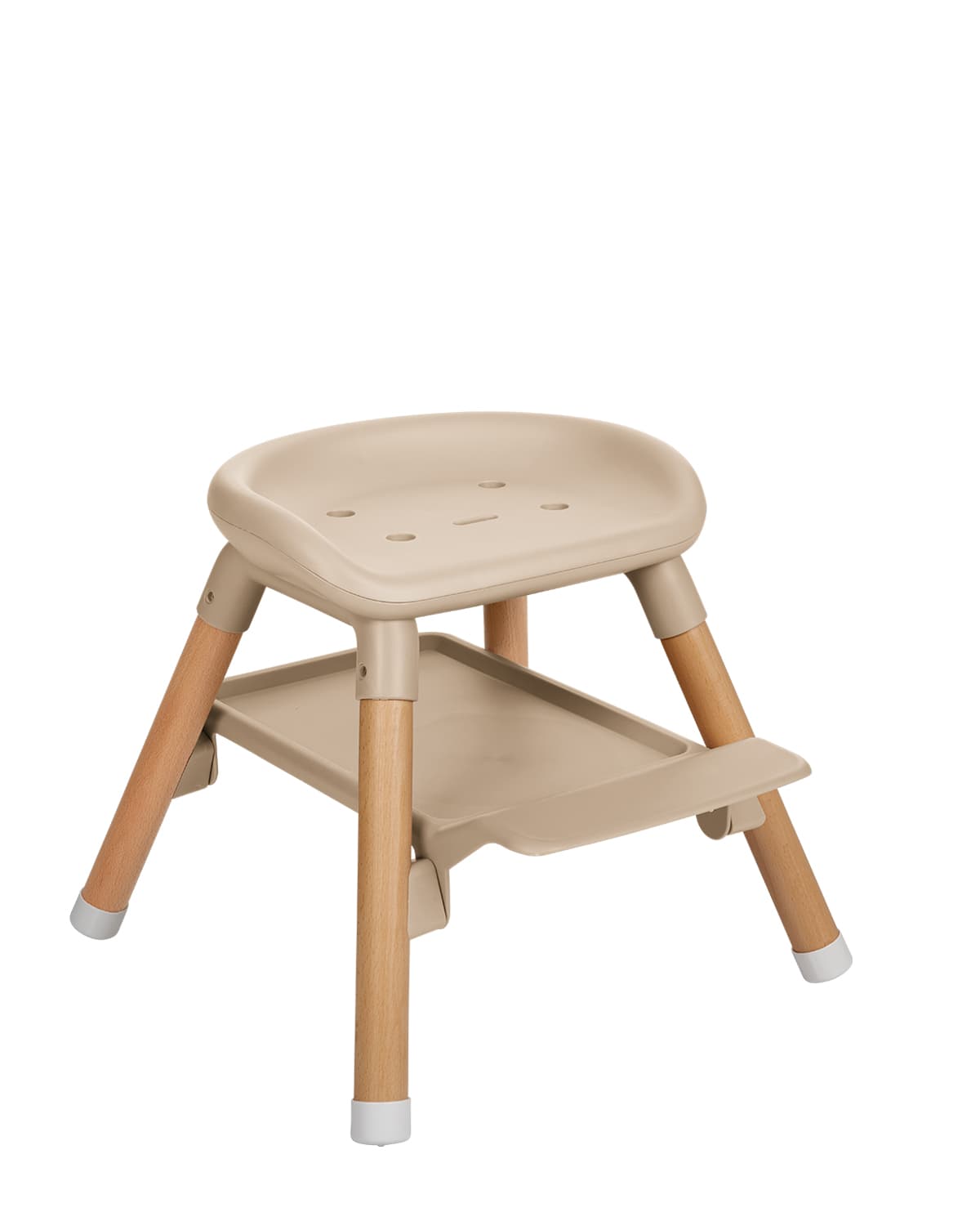 כיסא אוכל Woody 6in1 בתצורת שרפרף נמוך, עם מושב בז' ורגלי עץ קצרות.
